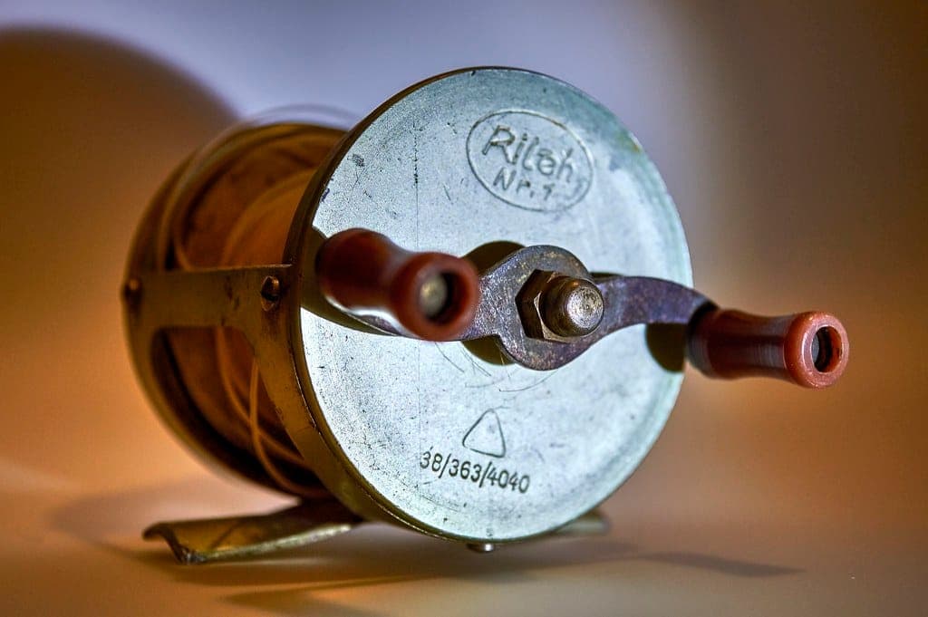 A close view of a spinning reel and its spool