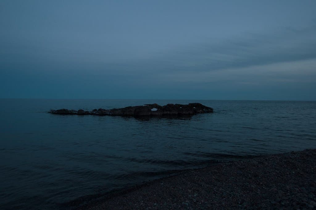A rocky freshwater shoreline